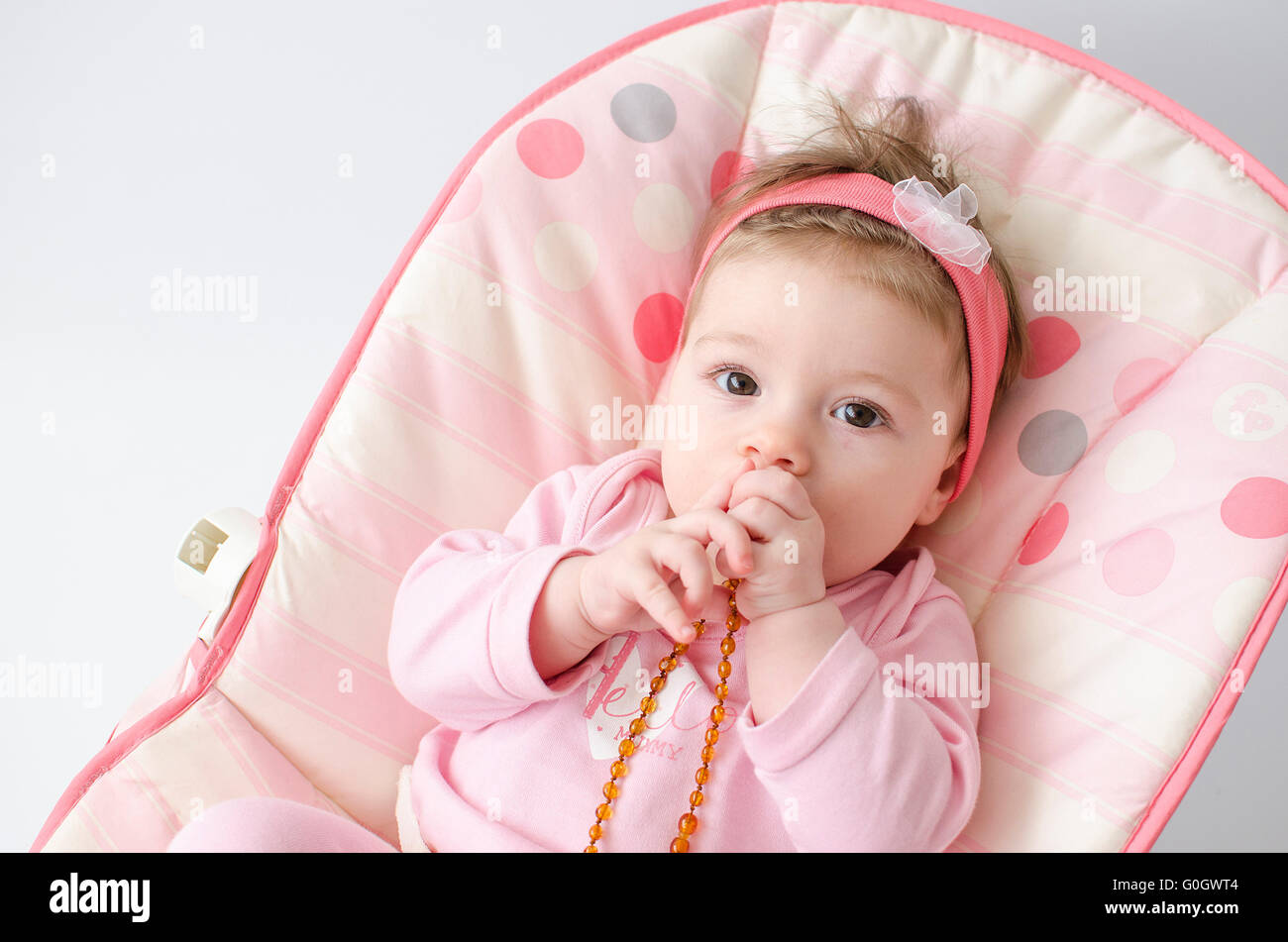 teething baby girl Stock Photo Alamy