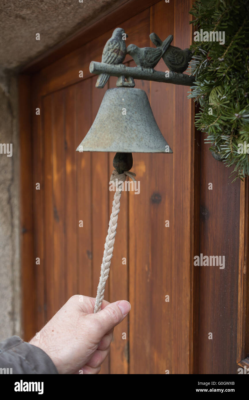 Person ringing at Old doorbell - Close-up Stock Photo