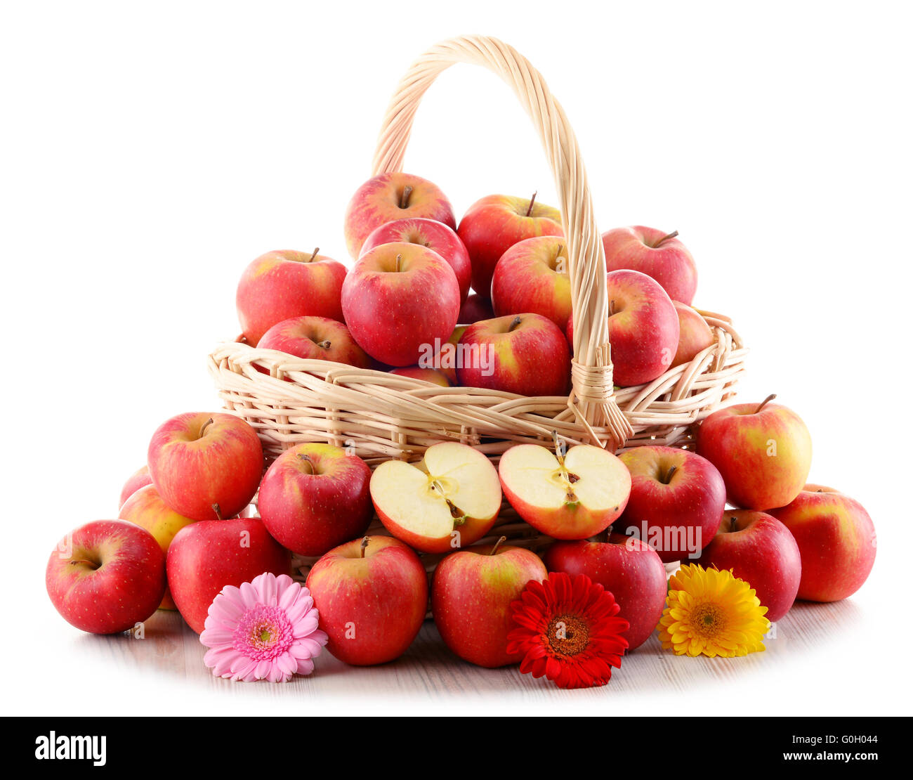 Apples in wicker basket isolated on white background Stock Photo - Alamy