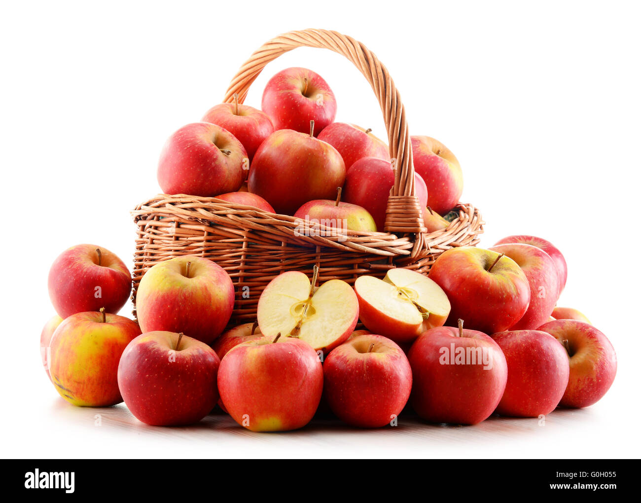 Apples in wicker basket isolated on white background Stock Photo - Alamy