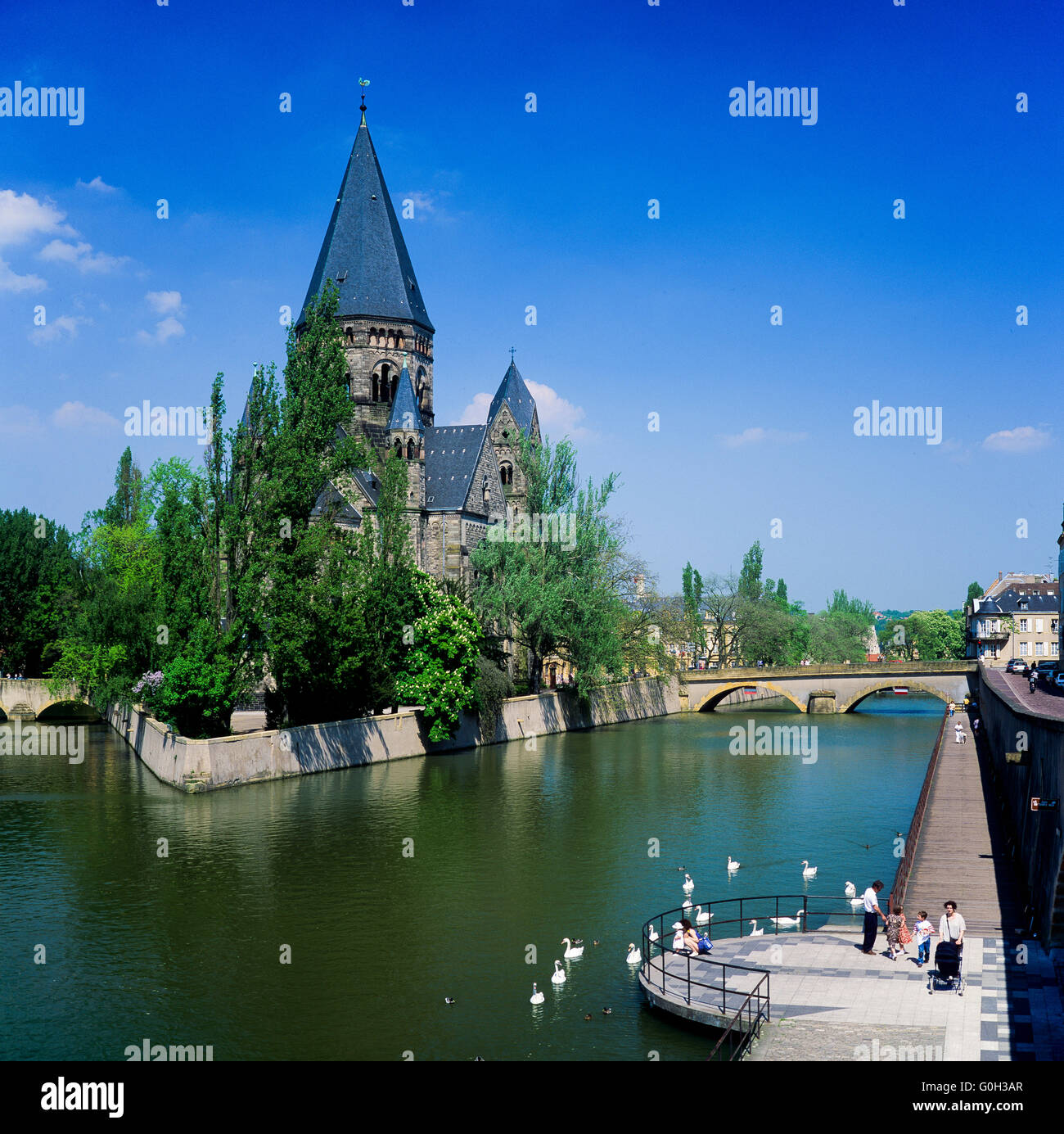Moselle river and Temple-Neuf Protestant church 1901, Metz, Lorraine, France Stock Photo