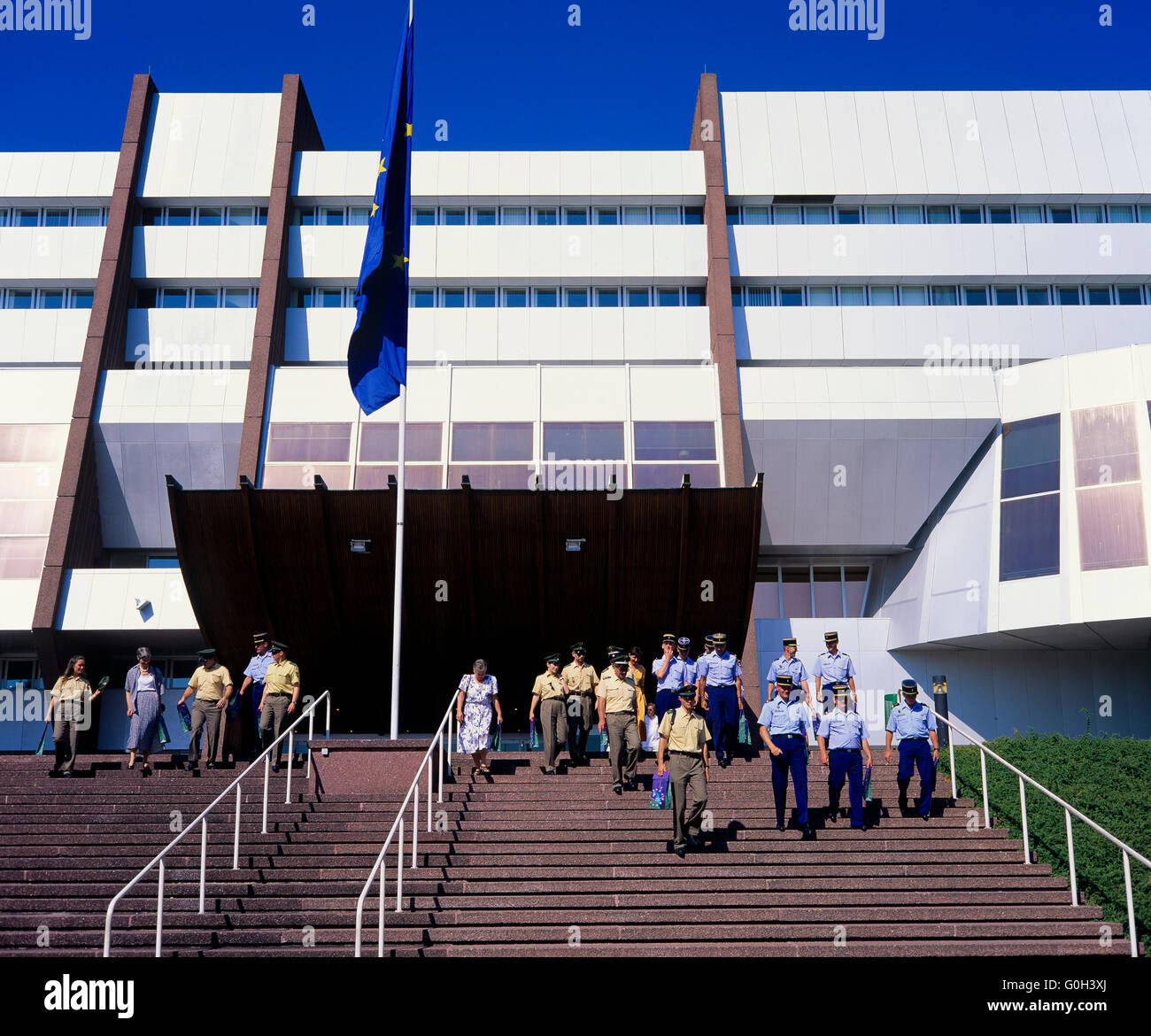 German policemen and French Gendarmes on stairs of Council of Europe, Palais de l'Europe, Strasbourg, Alsace, France, Europe Stock Photo