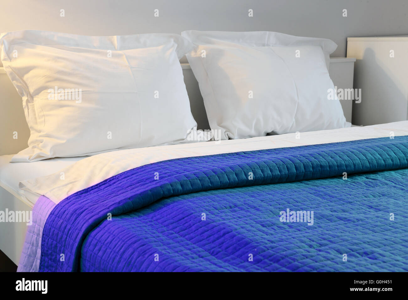 Double bed in hotel room. Stock Photo Alamy