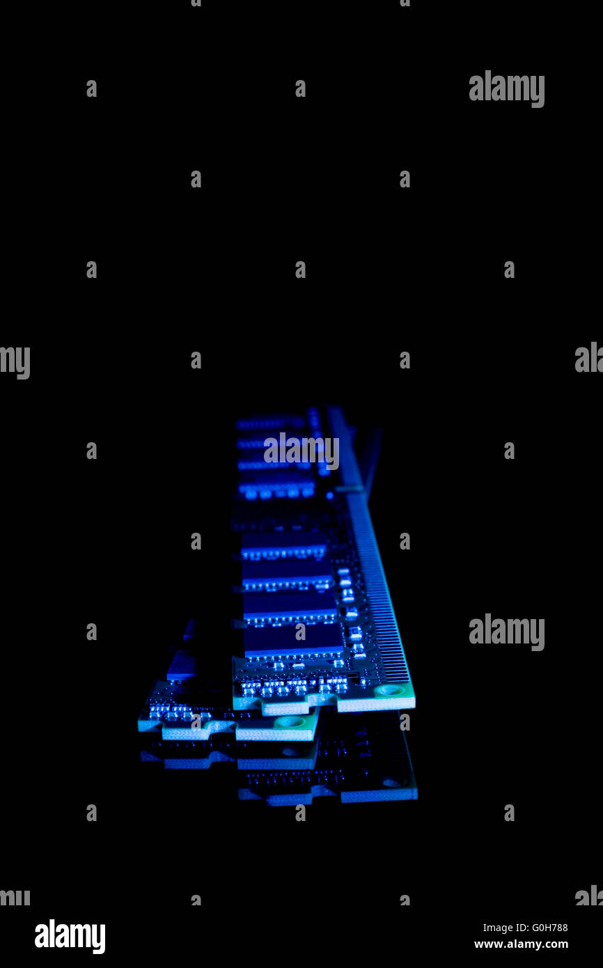 Computer random access memory (RAM) modules on the black background ...