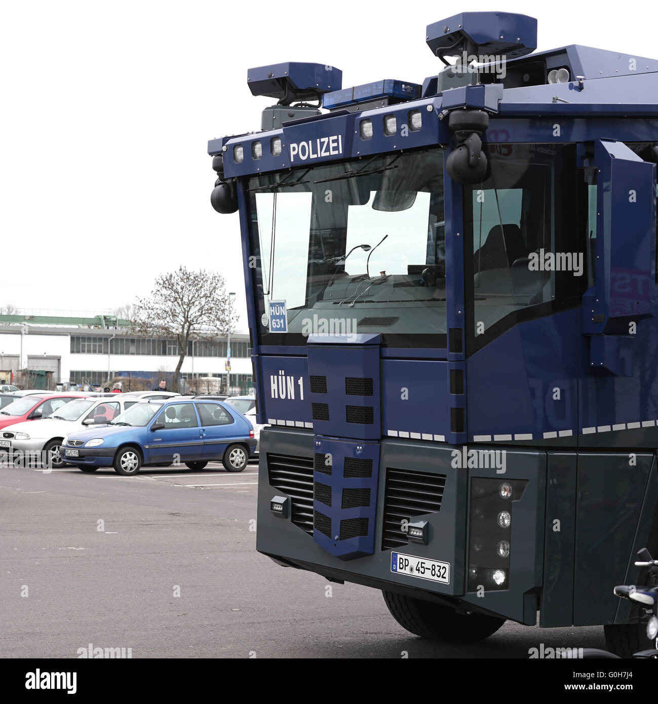 Water cannon against the football stadium in Magdeburg Stock Photo