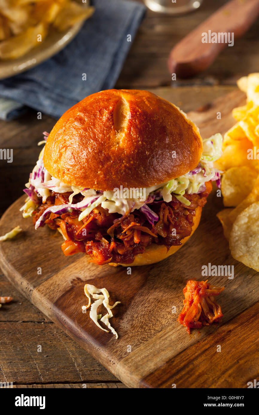 Homemade Vegan Pulled Jackfruit BBQ Sandwich with Coleslaw and Chips Stock Photo