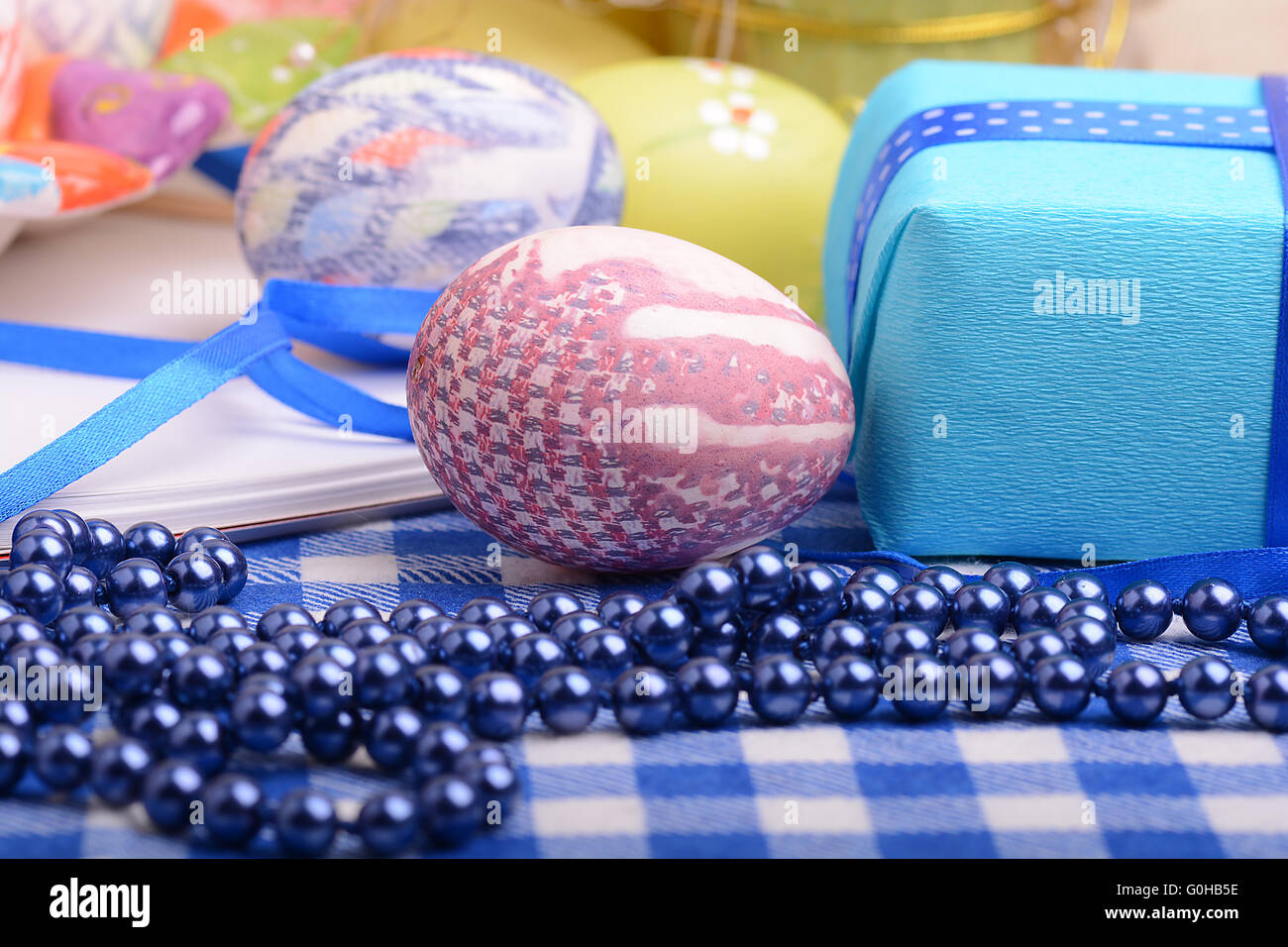 Assorted Easter coloured eggs in the paper egg box Stock Photo Alamy