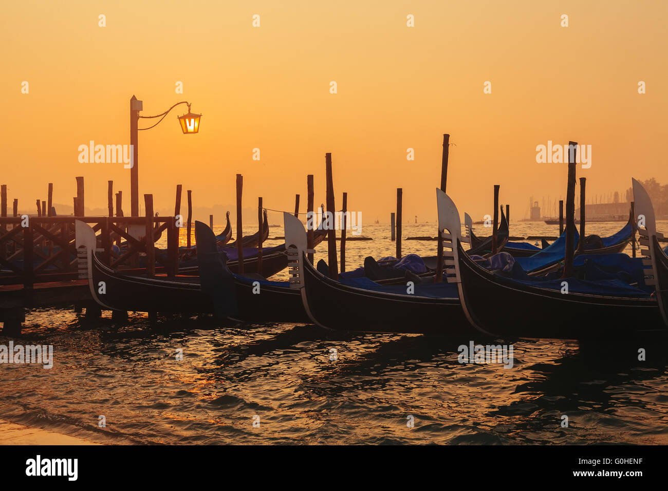 Venetian gondolas at sunrise Stock Photo - Alamy