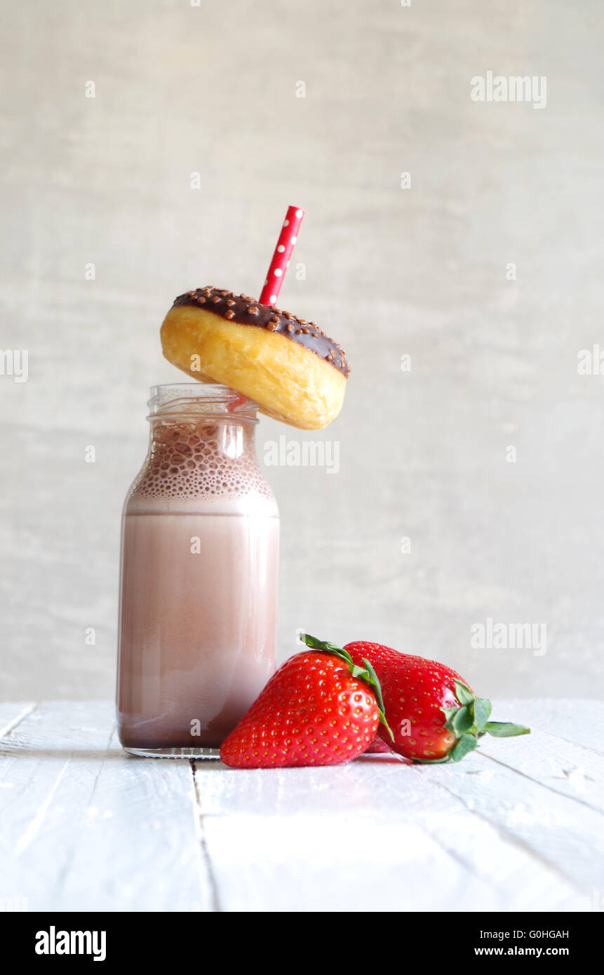 chocolate milk and chocolate donut with strawberries Stock Photo