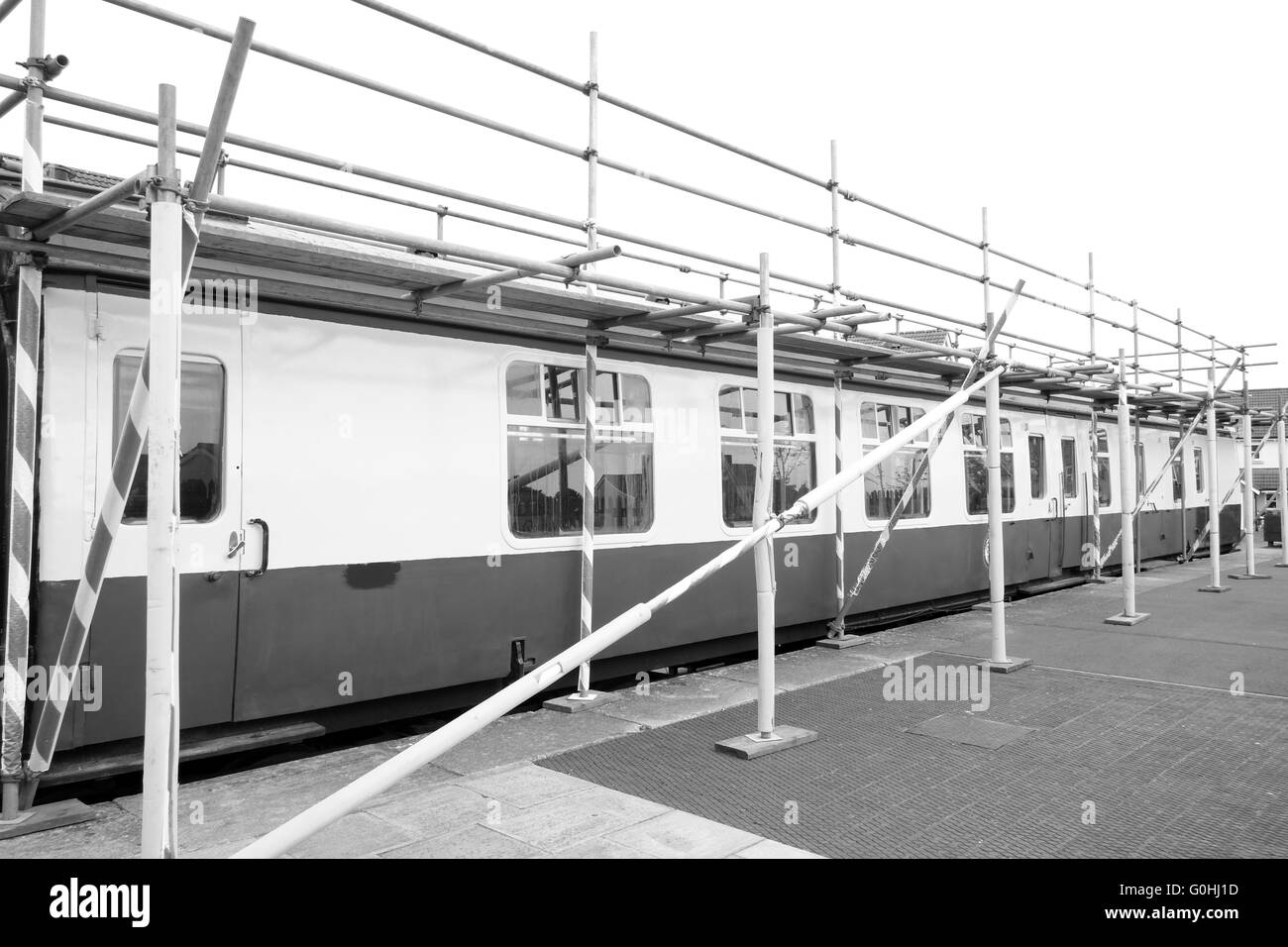 Static railway carriage in a display with scaffold to allow its roof to be repaired. May 2016 Static railway carriage in a display with scaffold to allow its roof to be repaired. May 2016