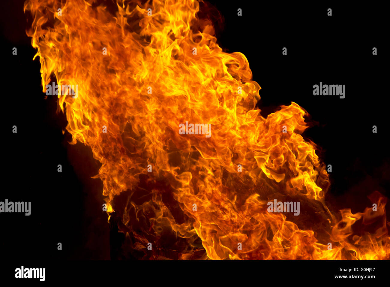 Red fire flame on black background Stock Photo - Alamy