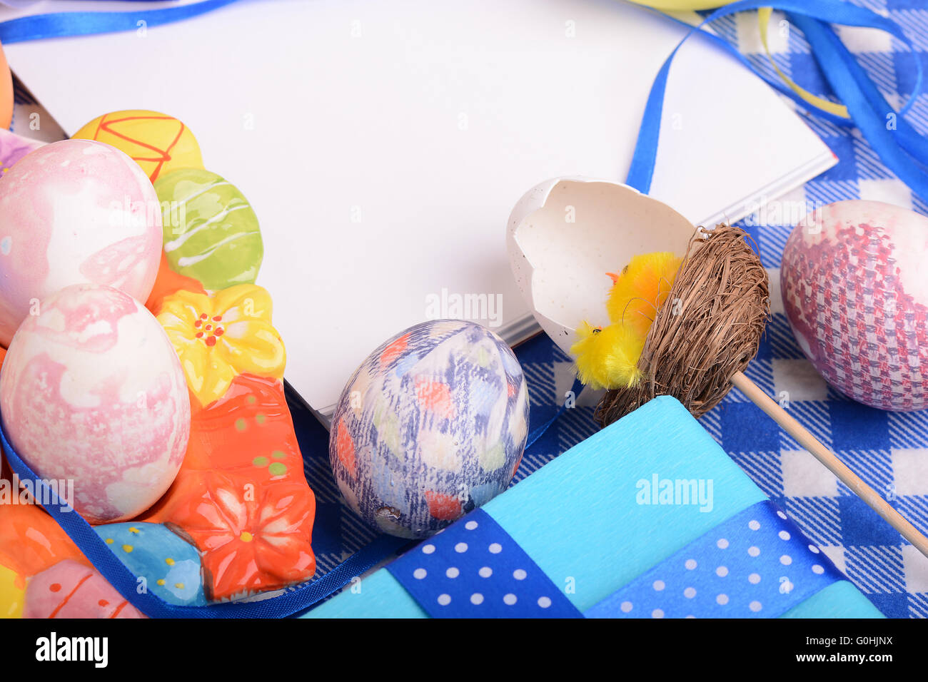 Assorted Easter coloured eggs in the paper egg box Stock Photo Alamy