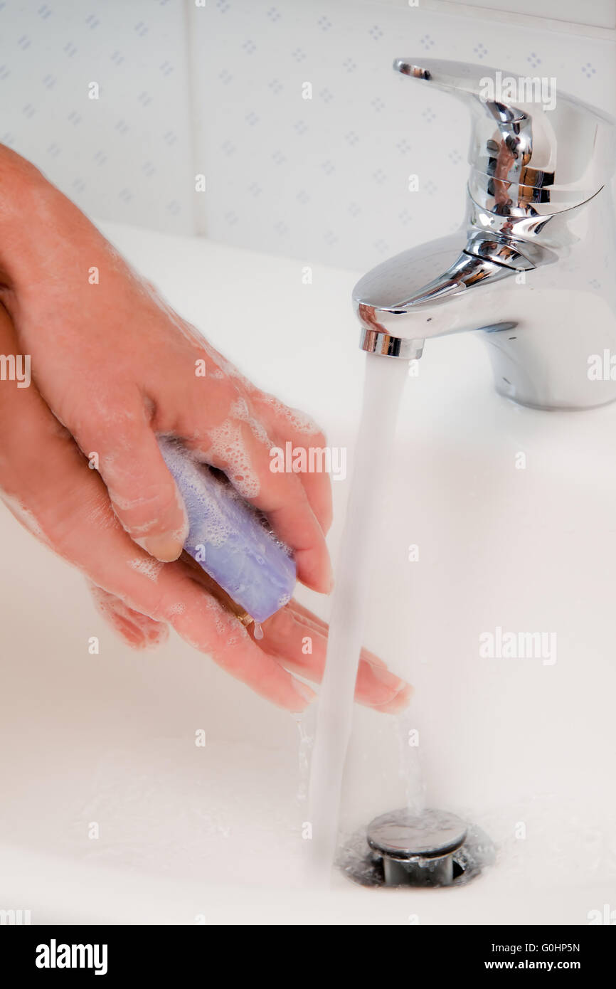 Wash hands. New protection against swine flu HN1 Stock Photo