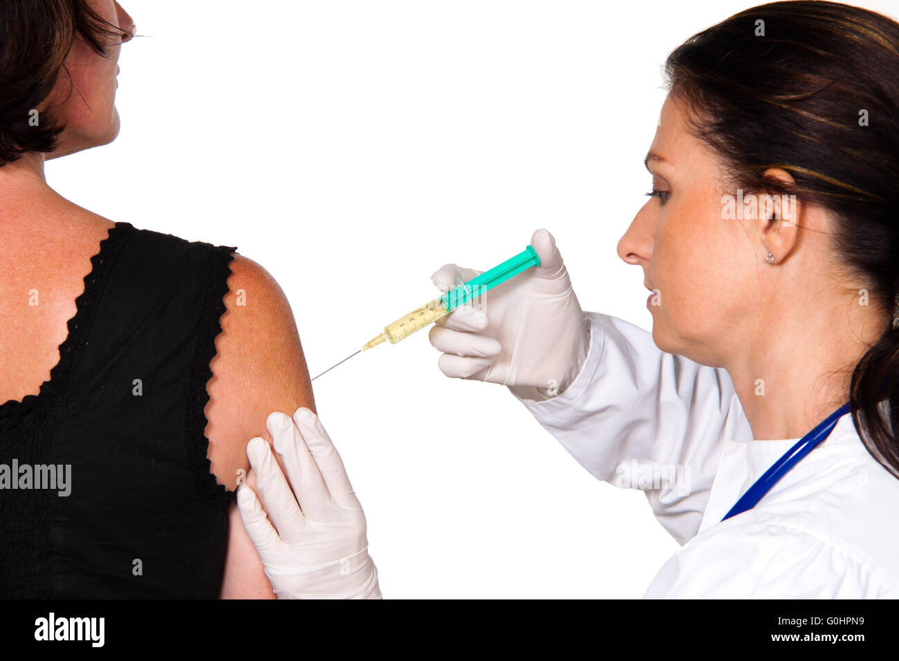 Doctor patient vaccinated against influenza disease us. Stock Photo