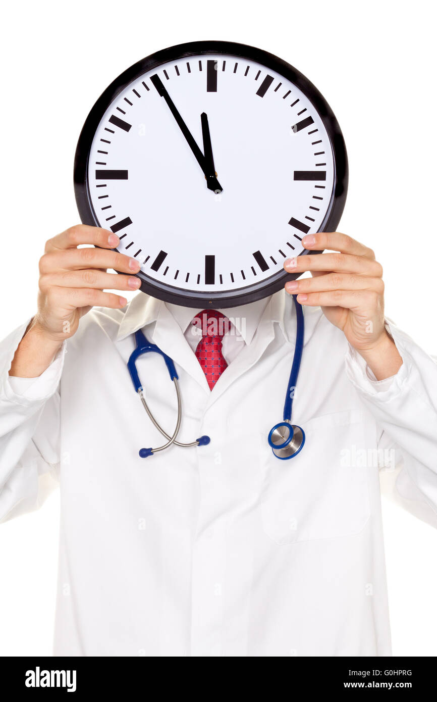 Doctors stress in front of the head with Clock. Working in Kranklenhau Stock Photo