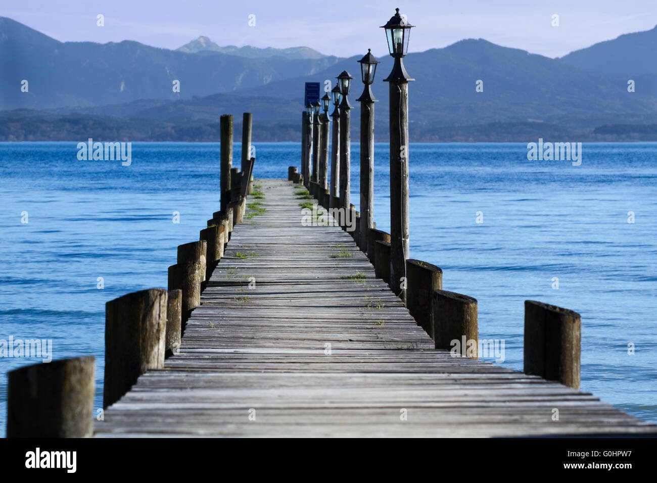 Jetty at lake Chiemsee Stock Photo