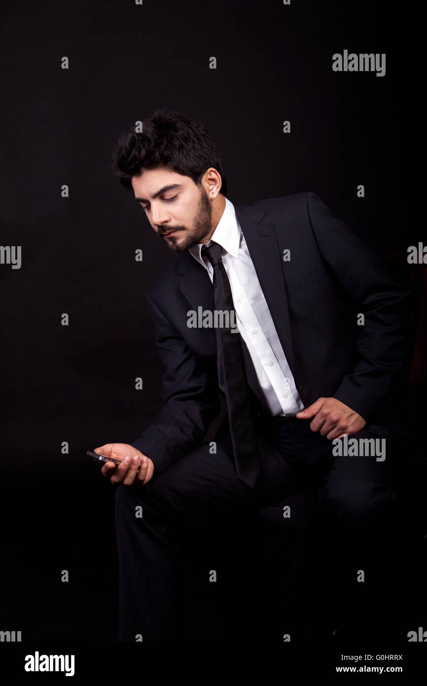 young successful business man with a suit isolated Stock Photo