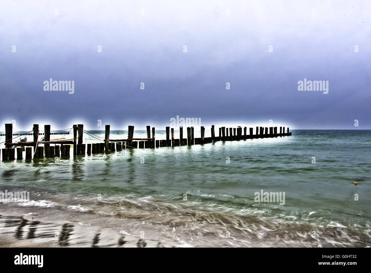 Groynes on coast of baltic sea Stock Photo