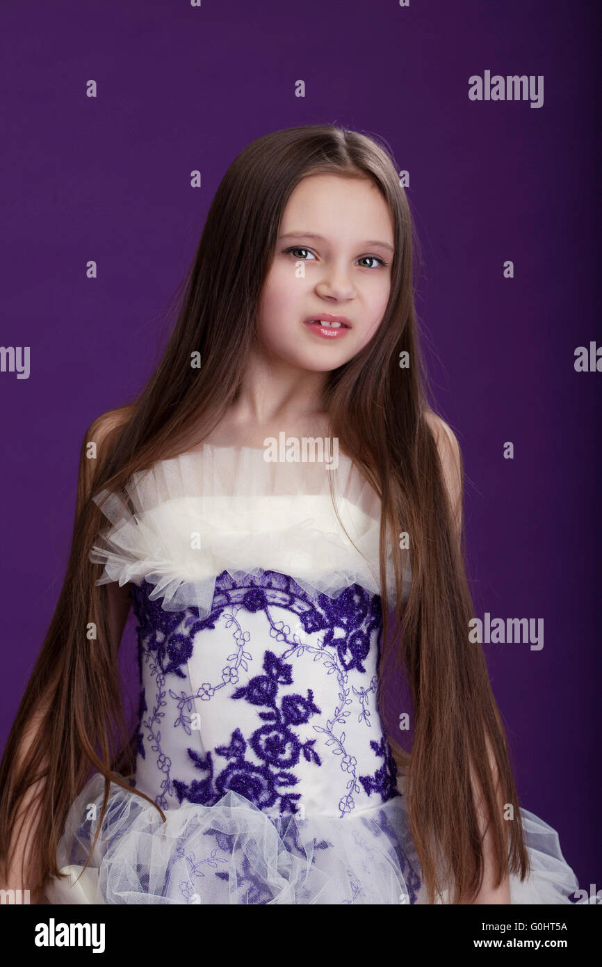 Portrait of beautiful little girl with long hair Stock Photo - Alamy