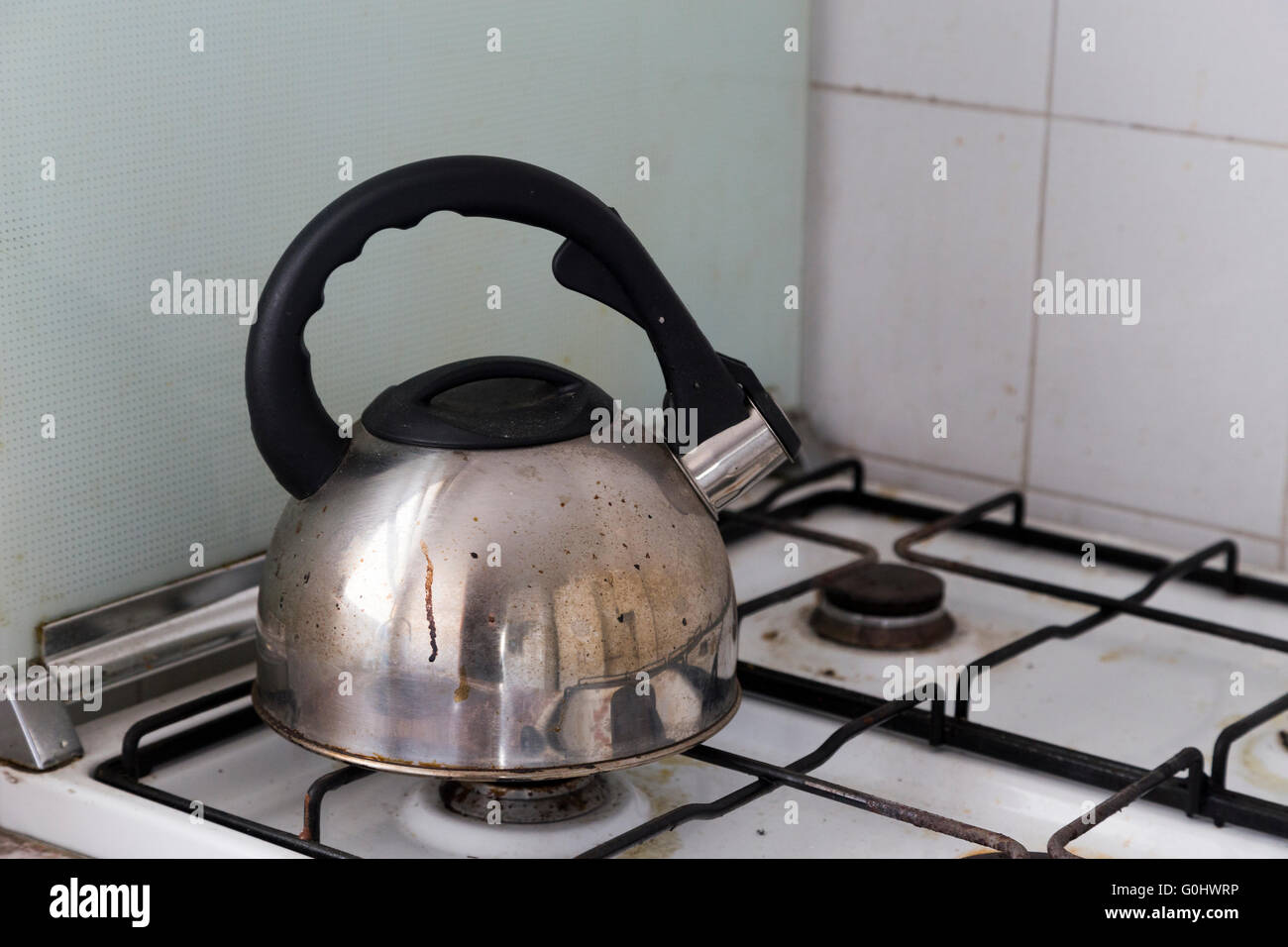 Dirty kettle on a kitchen Stock Photo Alamy