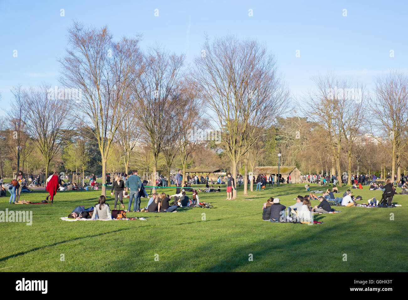 The crowded Parc de la Tete d'Or, a public park located in  the French city of Lyon, on the Easter weekend holiday. Stock Photo