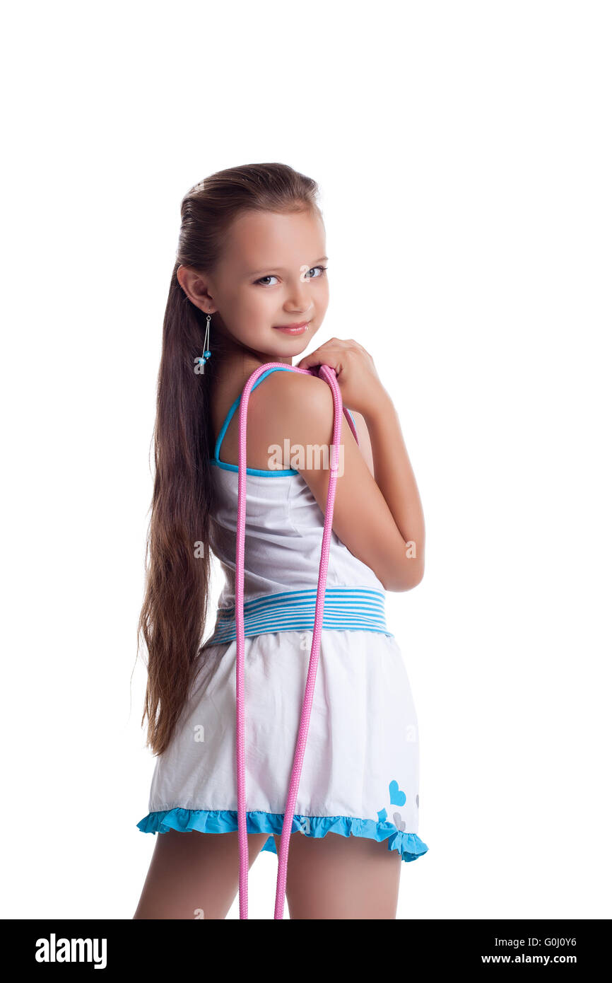 Young child posing with skipping rope isolated Stock Photo