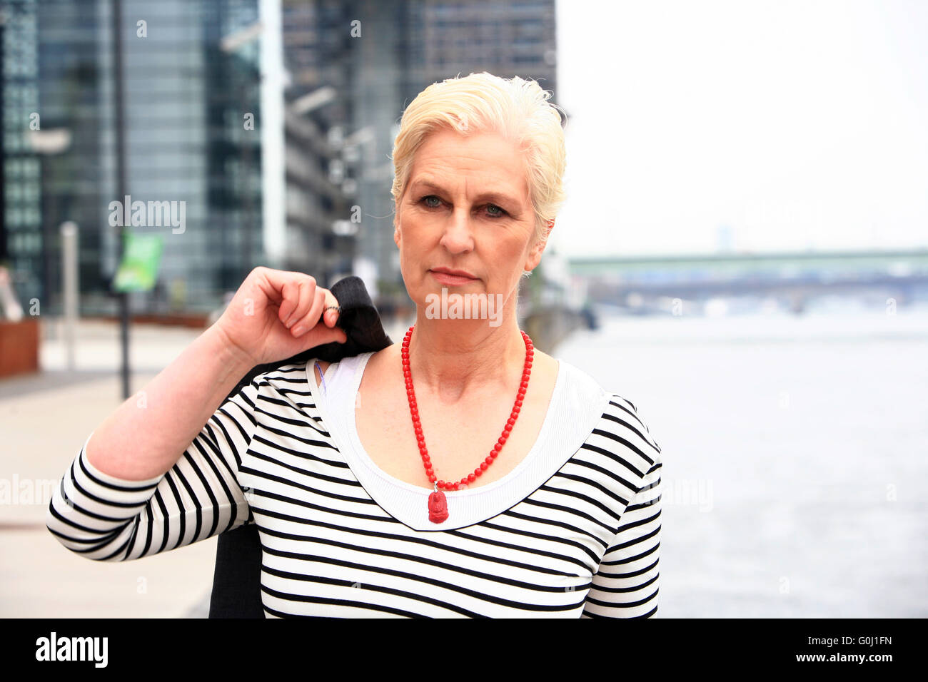 Portrait of a ninety year old woman. Beautiful old lady. Luxurious  grandmother on a black background. Elderly beauty. The gray-haired  well-groomed pensioner. 22120143 Stock Photo at Vecteezy