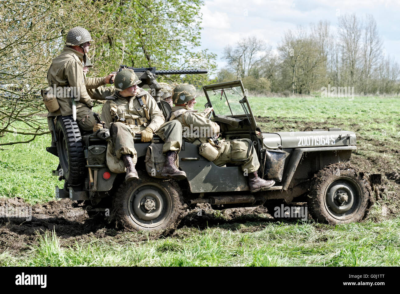 US Army Soldiers aboard a jeep. Stock Photo