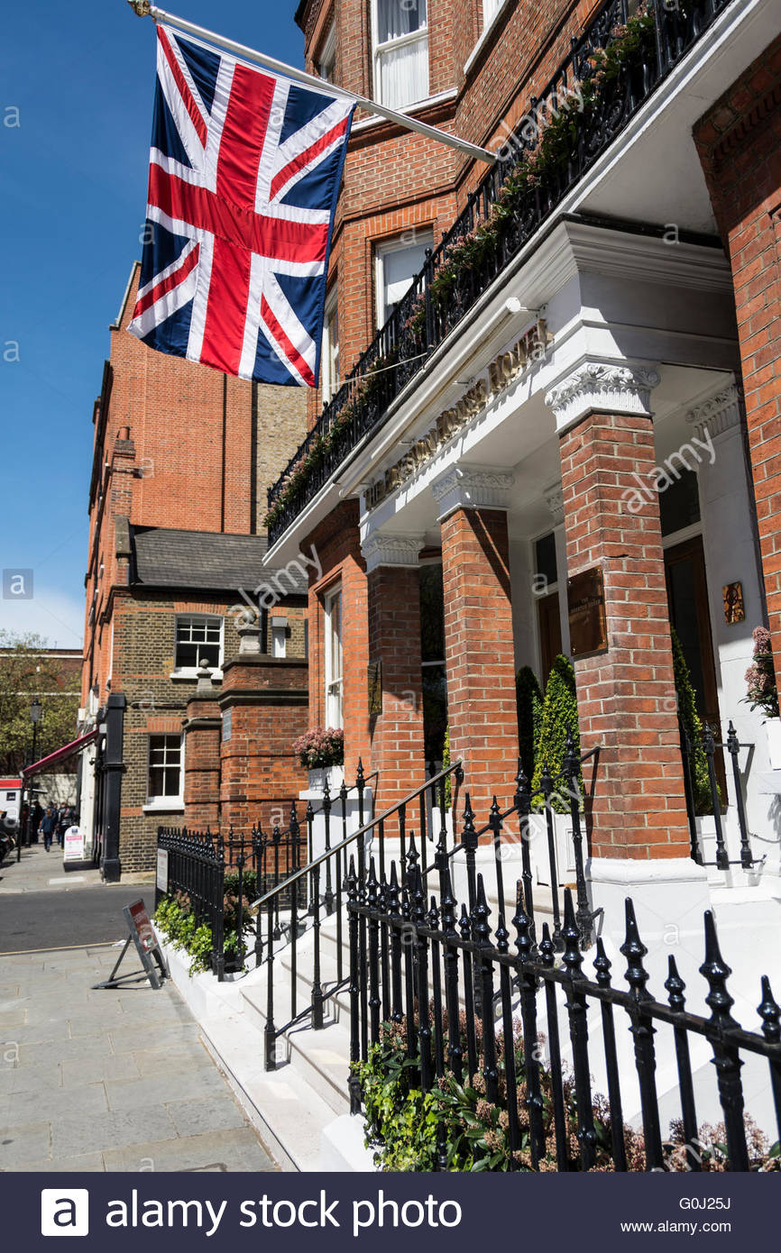 A Union Jack flies outside a hotel in central London Stock Photo ...