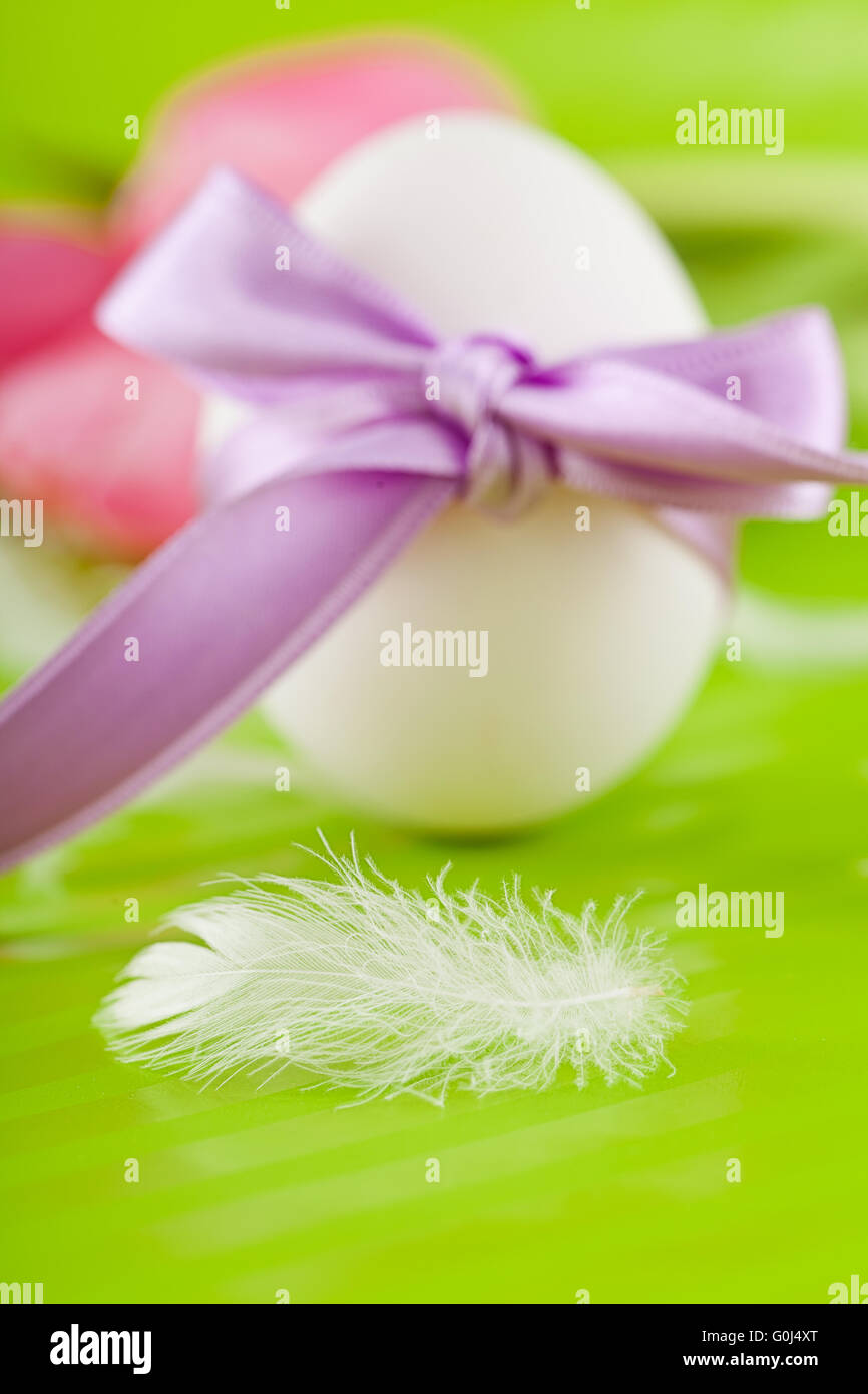traditional easter egg decoration with tulips and ribbon Stock Photo ...