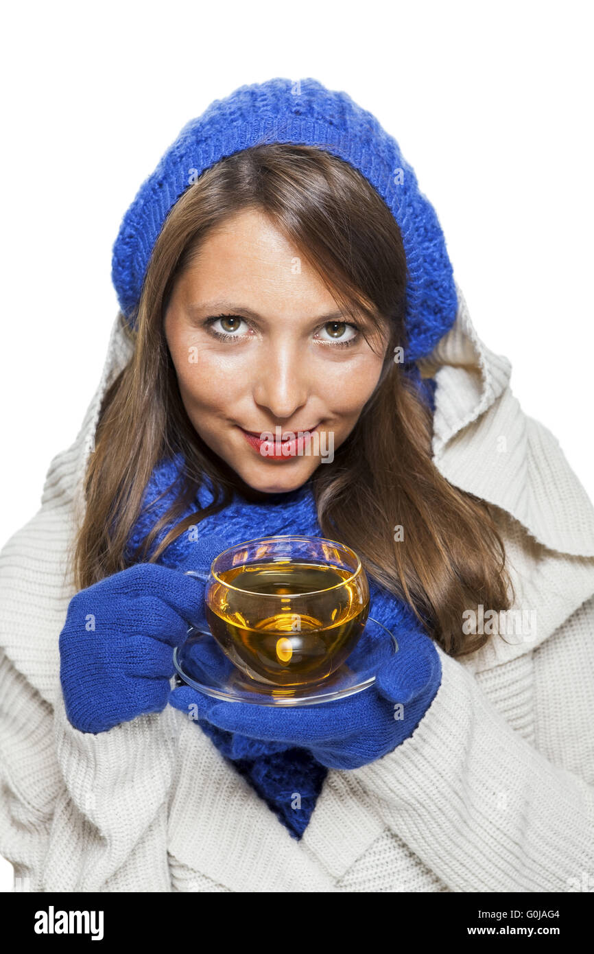 Fashionable young woman sipping hot tea Stock Photo