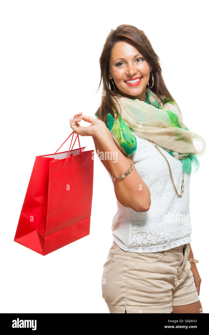 Fashionable Woman Looking Inside a Shopping Bag Stock Photo