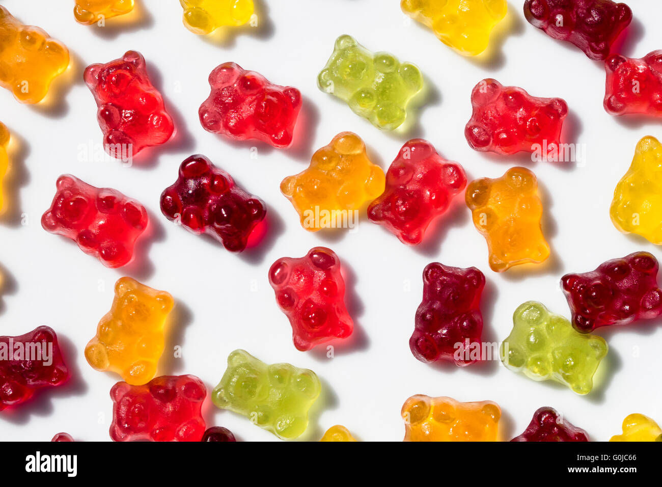 Detail of group of colorful gummy bears with isolated background Stock Photo