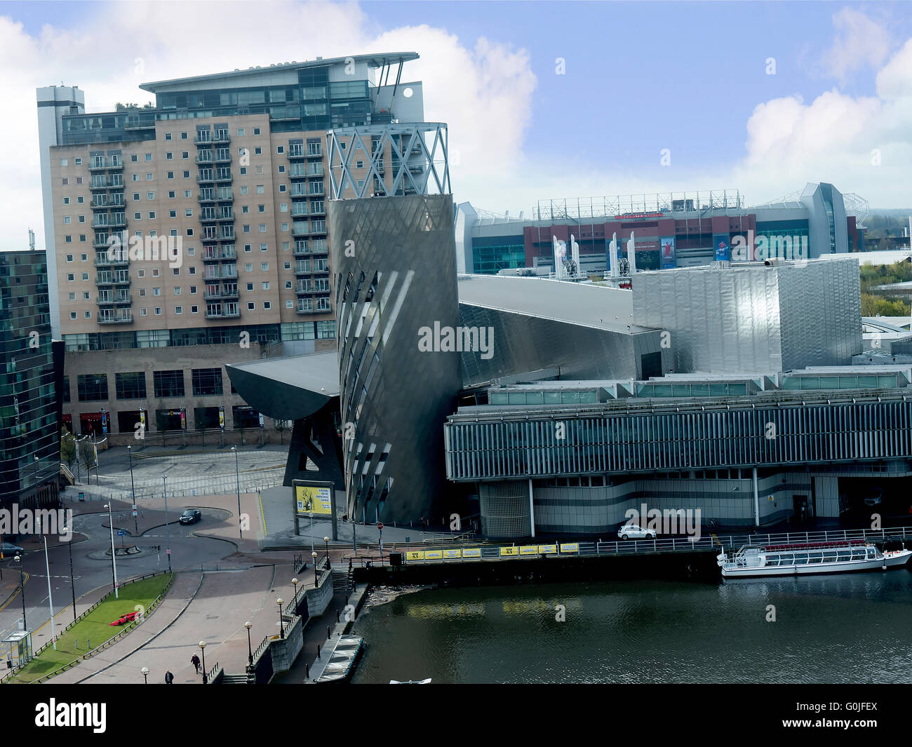The Salford Quays was once Manchester's Docklands but now it hosts MediacityUK,the Lowry Theatre and the Imperial War Museum Stock Photo