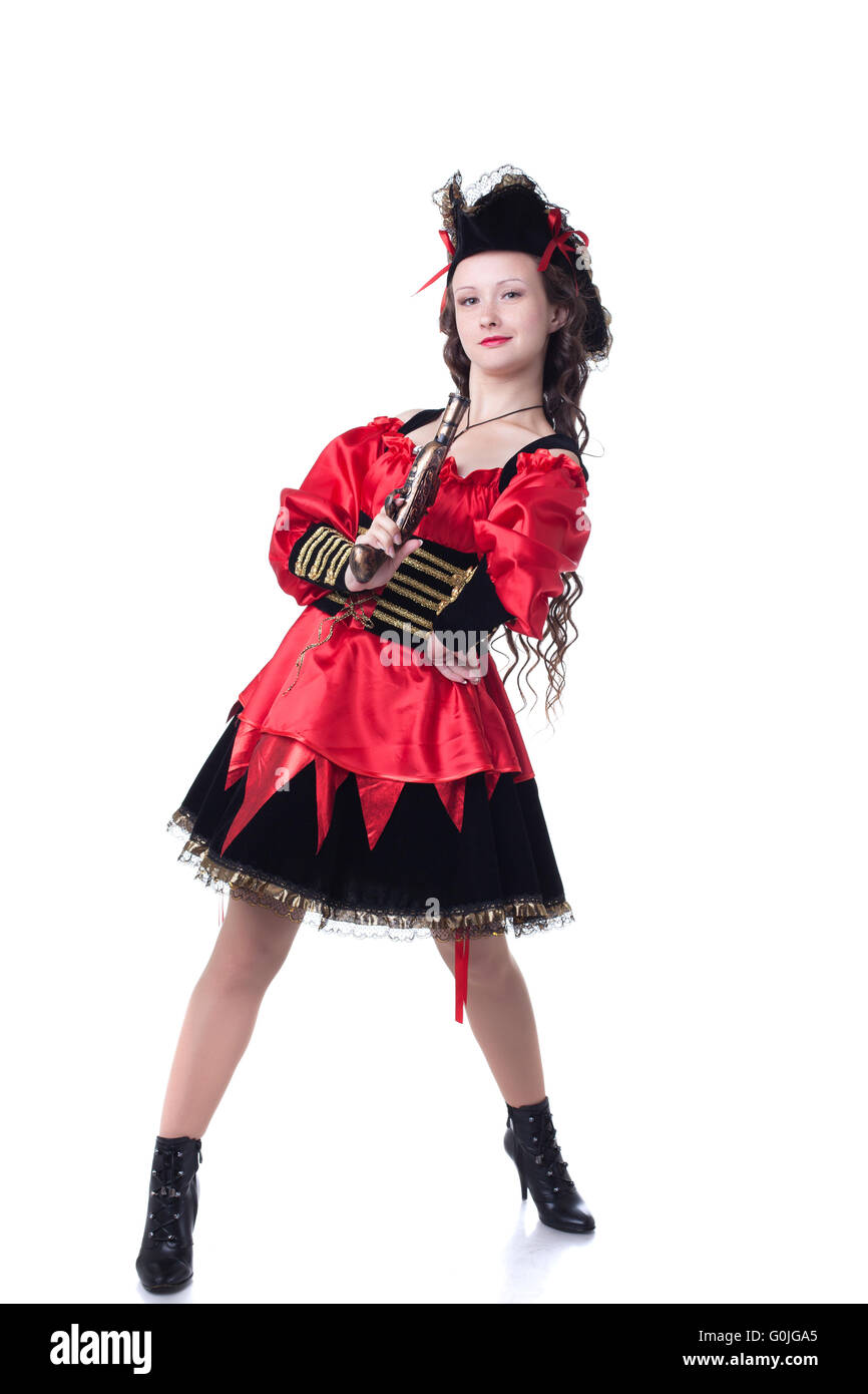 Bold young girl posing in pirate costume with gun Stock Photo - Alamy