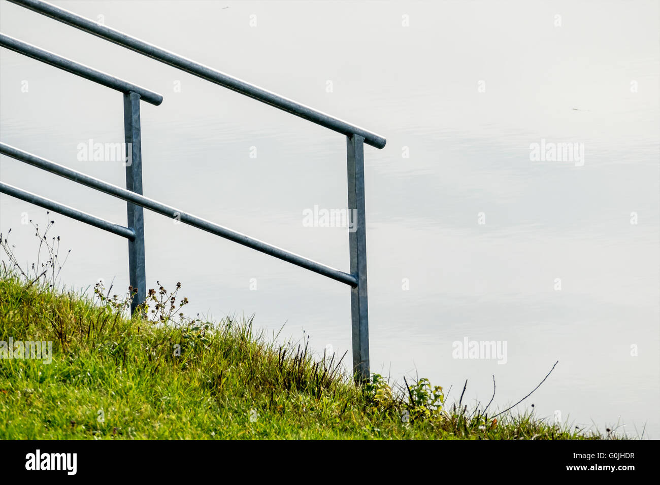 Onshore Railing railing on the shore Stock Photo - Alamy