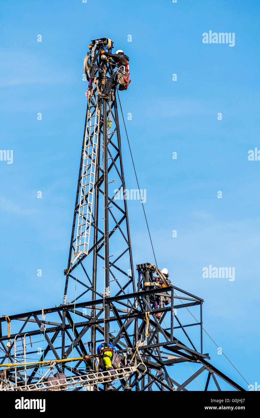 working on a power poles Stock Photo