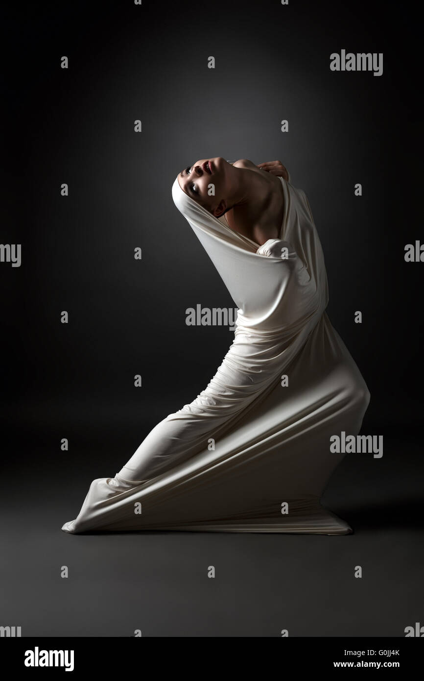Madness concept. Emotional girl in strange pose Stock Photo - Alamy
