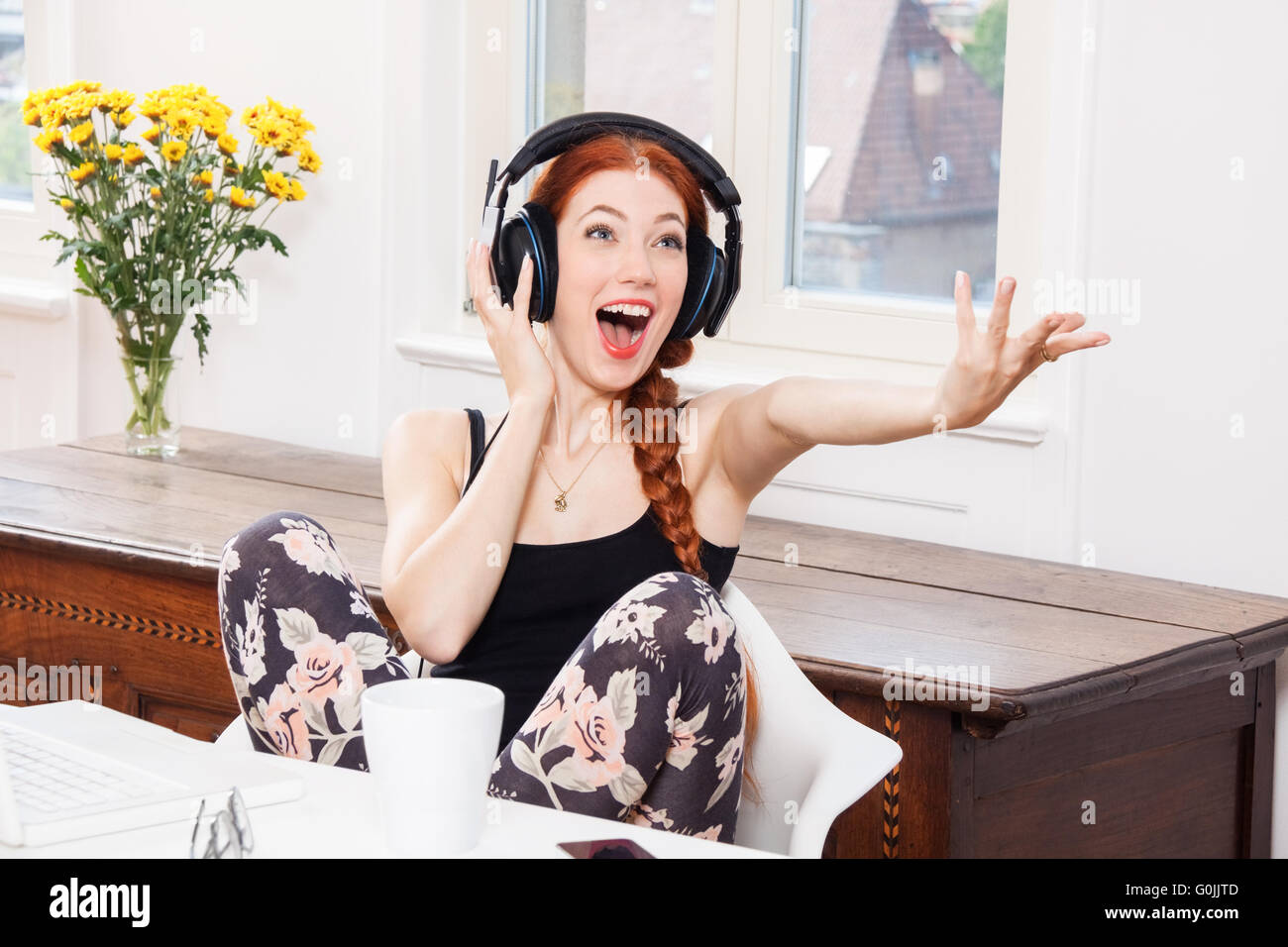 Happy Young Woman Listening Music In her Room Stock Photo - Alamy