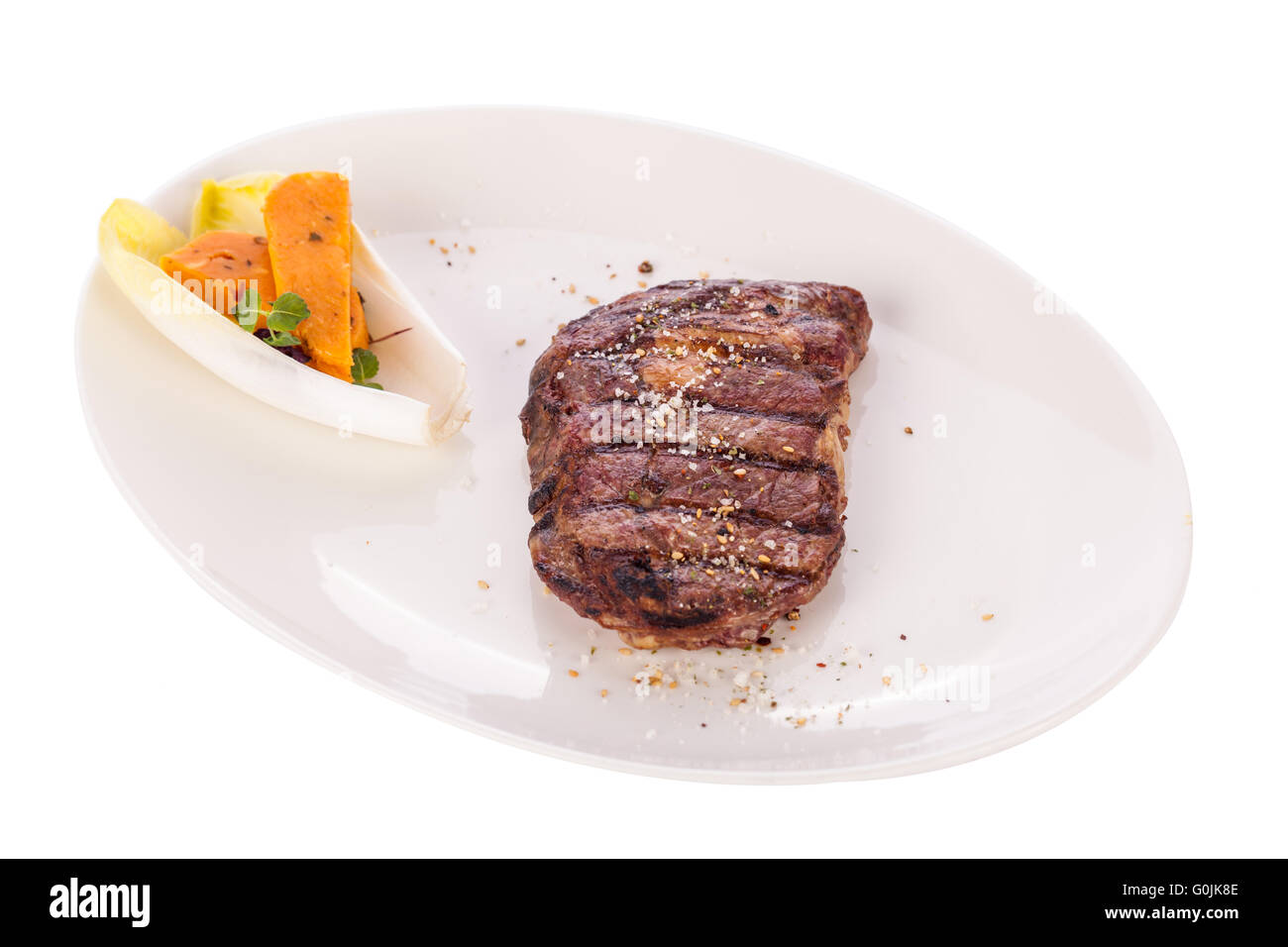 Grilled beef steak with seasoning Stock Photo - Alamy