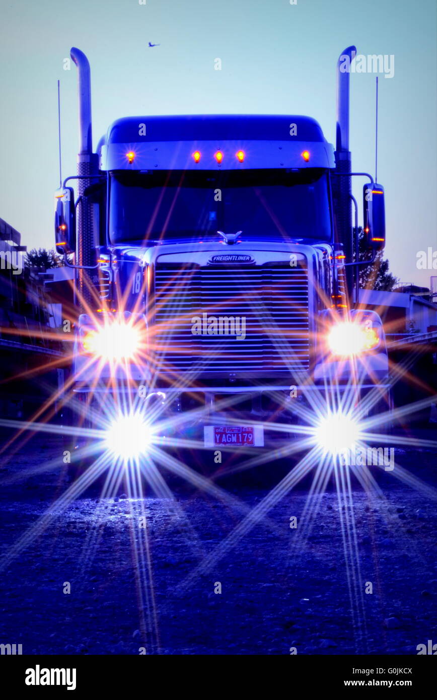 Semi truck with lights on Stock Photo