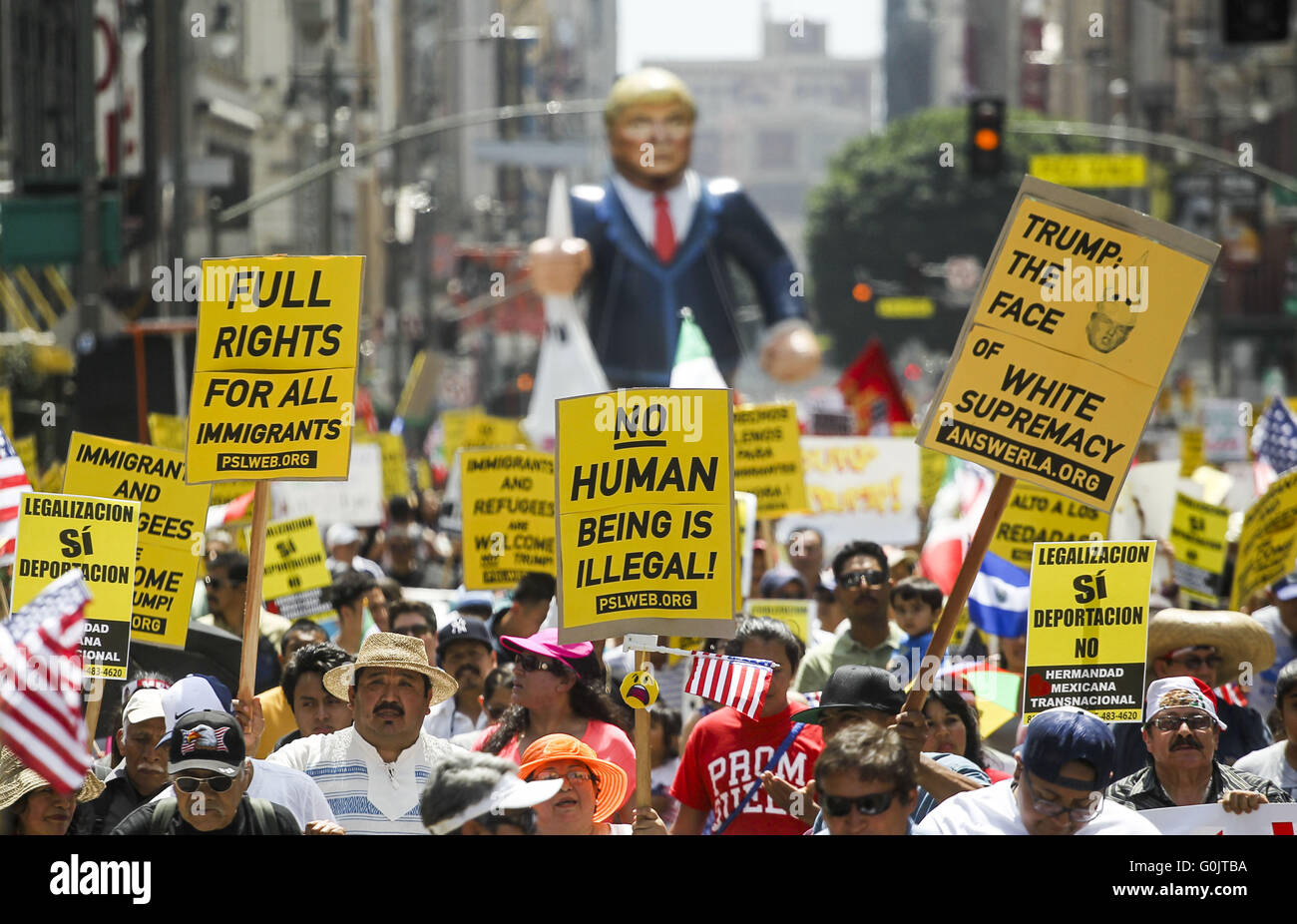 Los Angeles, California, USA. 1st May, 2016. Protesters march through