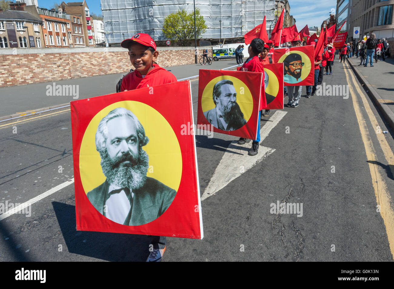 London, UK. 1st May, 2016. Socialists celebrate International Workers Day with a march from Clekenwell Green to Trafalgar Square. Sri Lankan communits with pictures of Marx, Engels, Lenin and Sri Lankan communist leaders. Peter Marshall/Alamy Live News Stock Photo