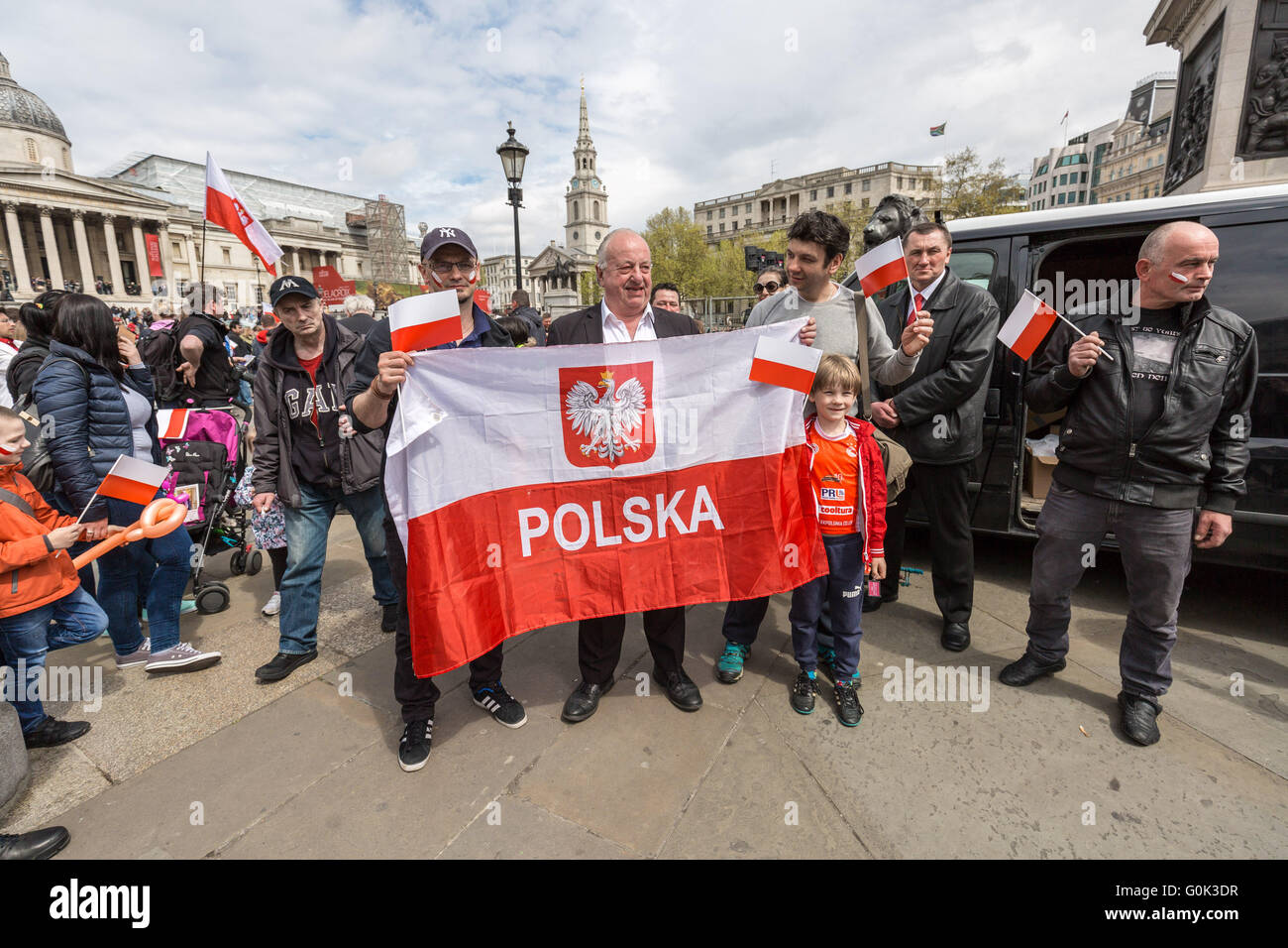 London, UK. 2nd May, 2016. London based Polish patriot Jan Żyliński (C)  announces his running for London Mayor on National Polish Flag day in  Trafalgar Square as he attempts to win over