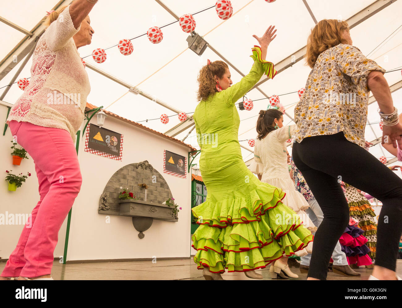 Flamenco dancing lesson at Feria de Abril event. Spain Stock Photo