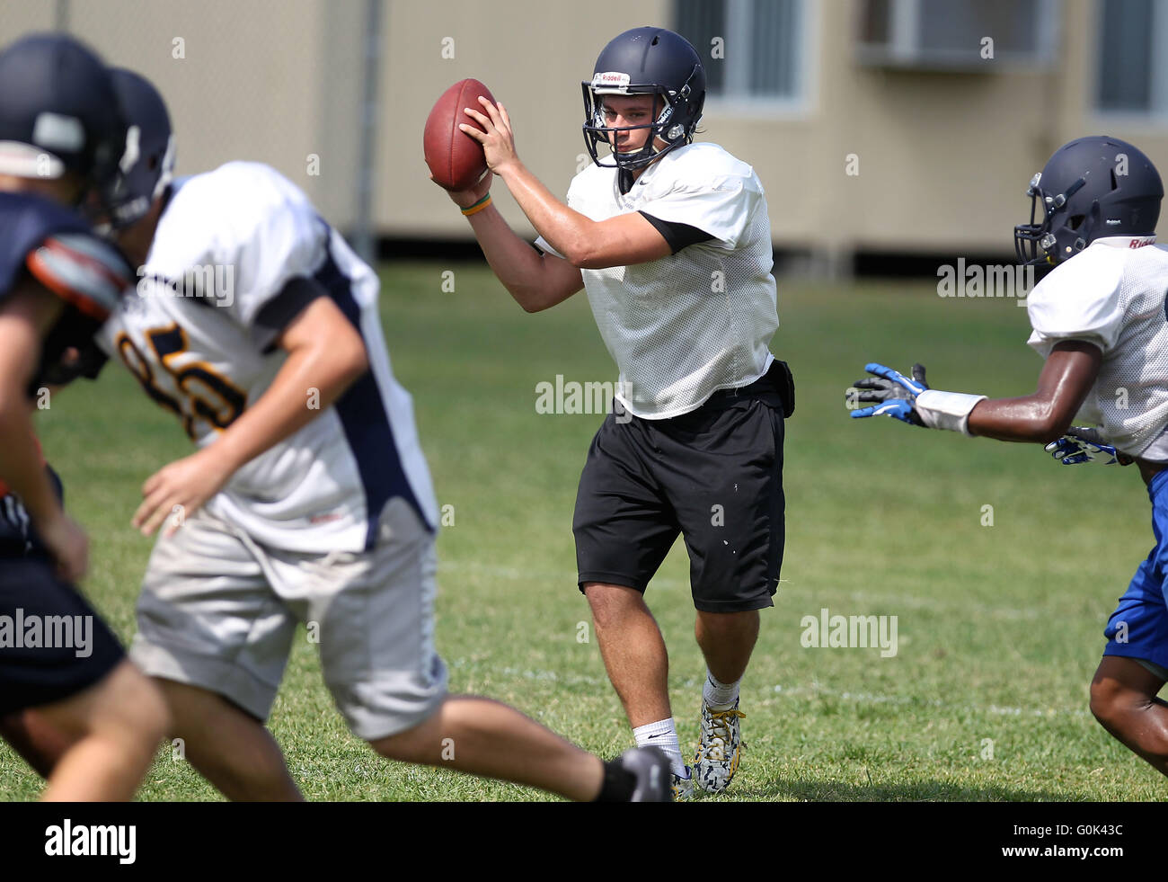 April 29, 2016 - Land O'Lakes, Florida, U.S. - BRENDAN FITTERER | Times.Spencer Childress takes snaps at quarterback during spring football practice at Land O'Lakes High School Thursday (4/28/16) (Credit Image: © Brendan Fitterer/Tampa Bay Times via ZUMA Wire) Stock Photo