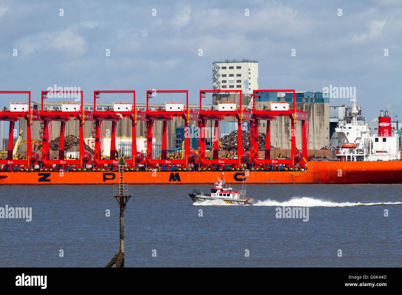 Operational cantilever rail-mounted gantry (CRMG) cranes in Liverpool, Merseyside, UK 2nd May, 2016. Chinese steel cranes arrive in the Mersey.  The Zhen Hua ship set off from a dock in Nantong, China, carrying six cranes that will be used on the £300m Liverpool2 deep-water container terminal construction project. The scheme, being led by Peel Ports, aims to deepen the Mersey estuary so it can accommodate some of the biggest boats in the world. A total of eight ship-to-shore ‘megamax’ cranes and 22 cantilever rail-mounted gantry cranes are being supplied to Peel Ports as part of Liverpool2. Stock Photo