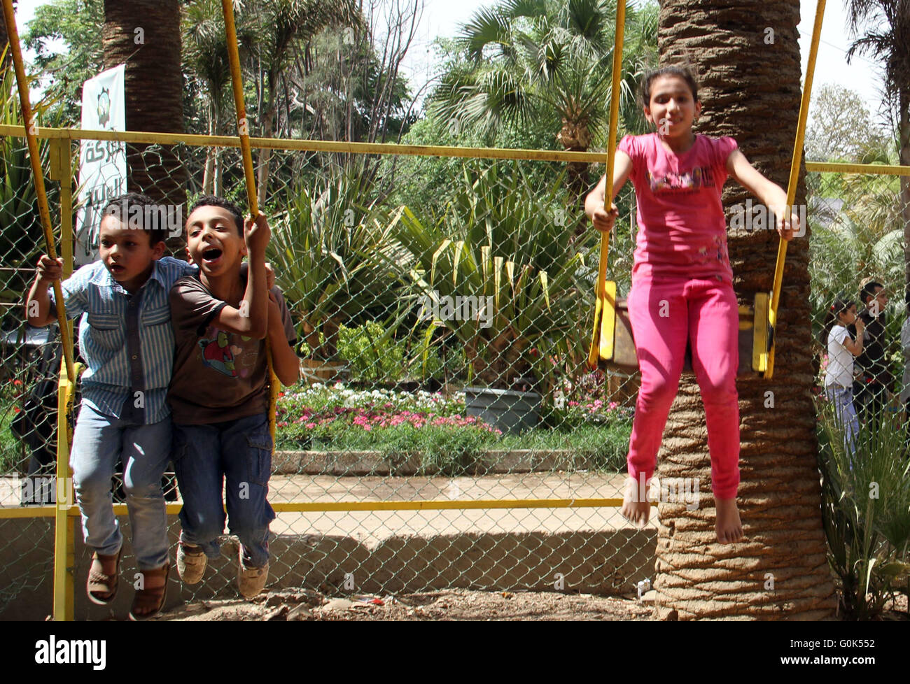 Cairo. 2nd May, 2016. Children play on the swings as they celebrate the
