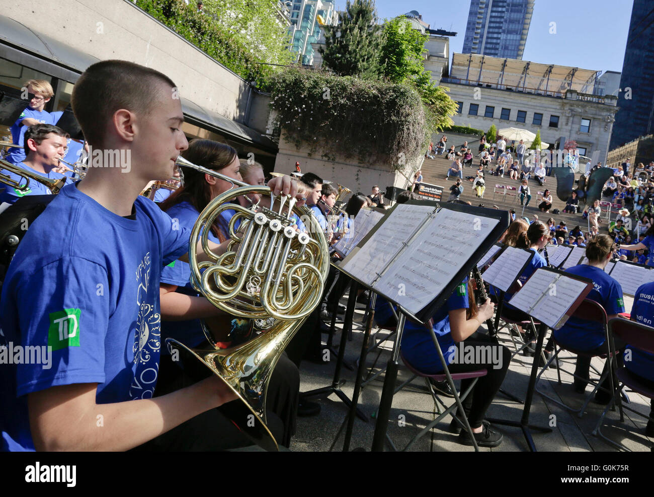 Vancouver, Canada. 2nd May, 2016. Members of a student band perform during the 'Music Monday' event at Robson Square in Vancouver, Canada, May. 2, 2016. More than 200 students perform a music concert in the public space in downtown Vancouver during the national wide 12th annual Music Monday event. The Music Monday is a large single event dedicated to promoting music education launched in 2005 by the Coalition for Music Education in Canada . Credit:  Liang Sen/Xinhua/Alamy Live News Stock Photo