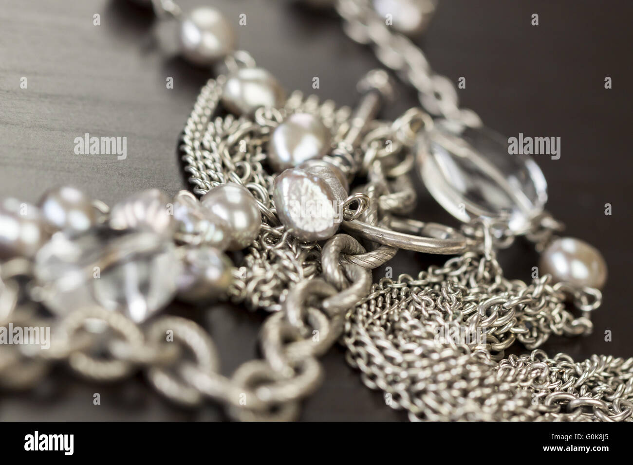 Assorted silver costume jewellery Stock Photo